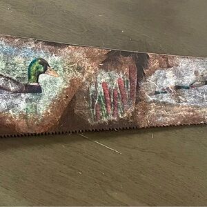 Decorative Saw with Duck Design